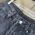 Maison Margiela denim jeans front pocket and button details with distressing
