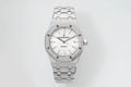 Audemars Piguet steel watch with white dial, baton markers, and link bracelet