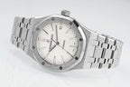 Audemars Piguet steel watch with white dial, baton hands, and link bracelet