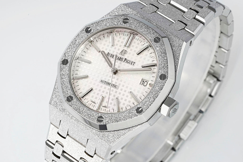 Audemars Piguet watch angled view with white dial, date window, and steel bracelet