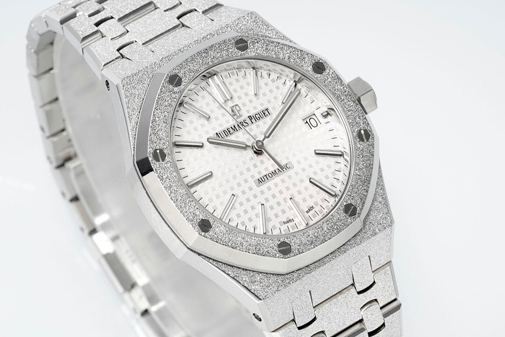 Audemars Piguet watch with white dial, baton markers, and textured steel case