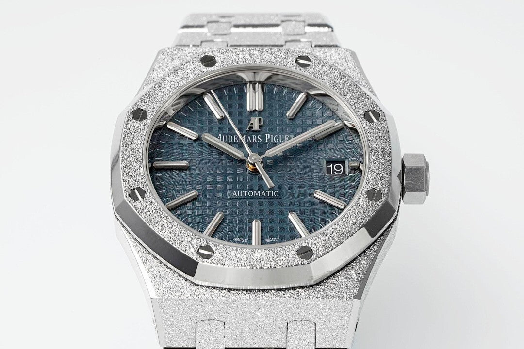 Audemars Piguet watch with blue dial, baton hour markers, and silver octagonal bezel
