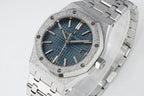 Audemars Piguet watch angled view with blue textured dial and silver link bracelet