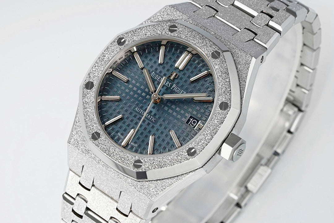 Audemars Piguet watch angled view with blue textured dial and silver link bracelet