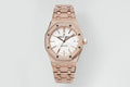Rose gold-toned Audemars Piguet-style automatic wristwatch with metal link bracelet
