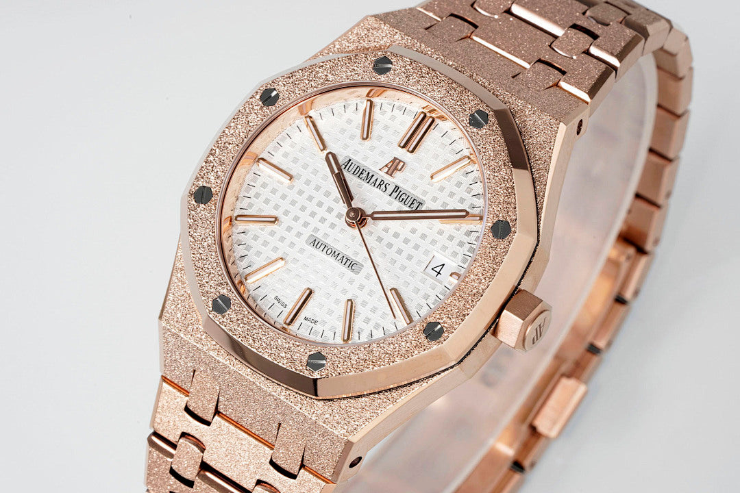 Rose gold-toned automatic wristwatch with white dial and Arabic numerals