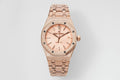 Audemars Piguet rose gold-tone automatic wristwatch with textured bracelet and dial