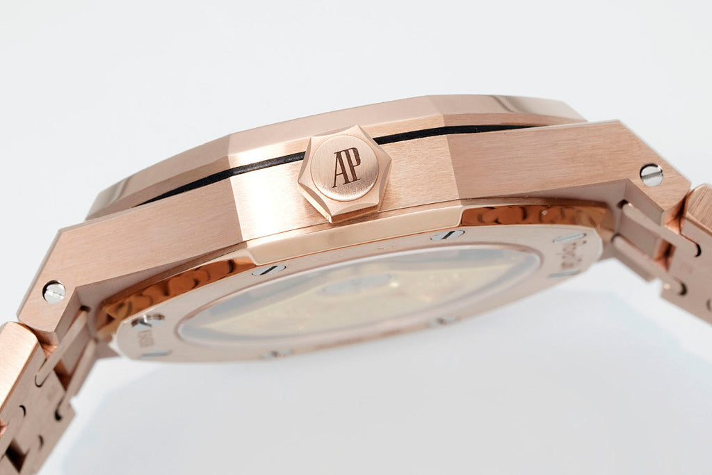 Audemars Piguet rose gold-tone watch case crown and emblem detail