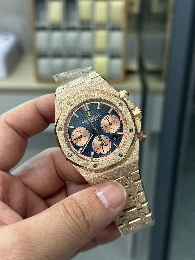 Audemars Piguet watch rose gold case with blue dial and chronograph subdials