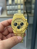 Audemars Piguet watch, gold case and bracelet, black chronograph dial with subdials