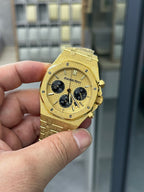 Audemars Piguet watch, gold dial with black subdials and chronograph hands