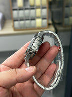 Audemars Piguet watch steel case side with crown guards, side angle