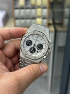 Steel chronograph watch with gray dial, black subdials and metal bracelet
