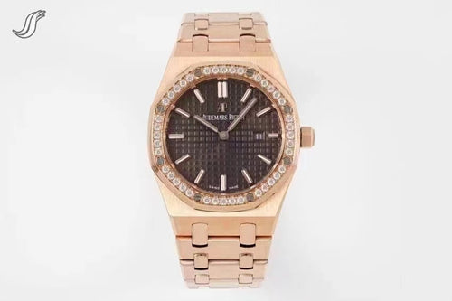 Rose gold wristwatch with black dial, diamond bezel, and link bracelet.