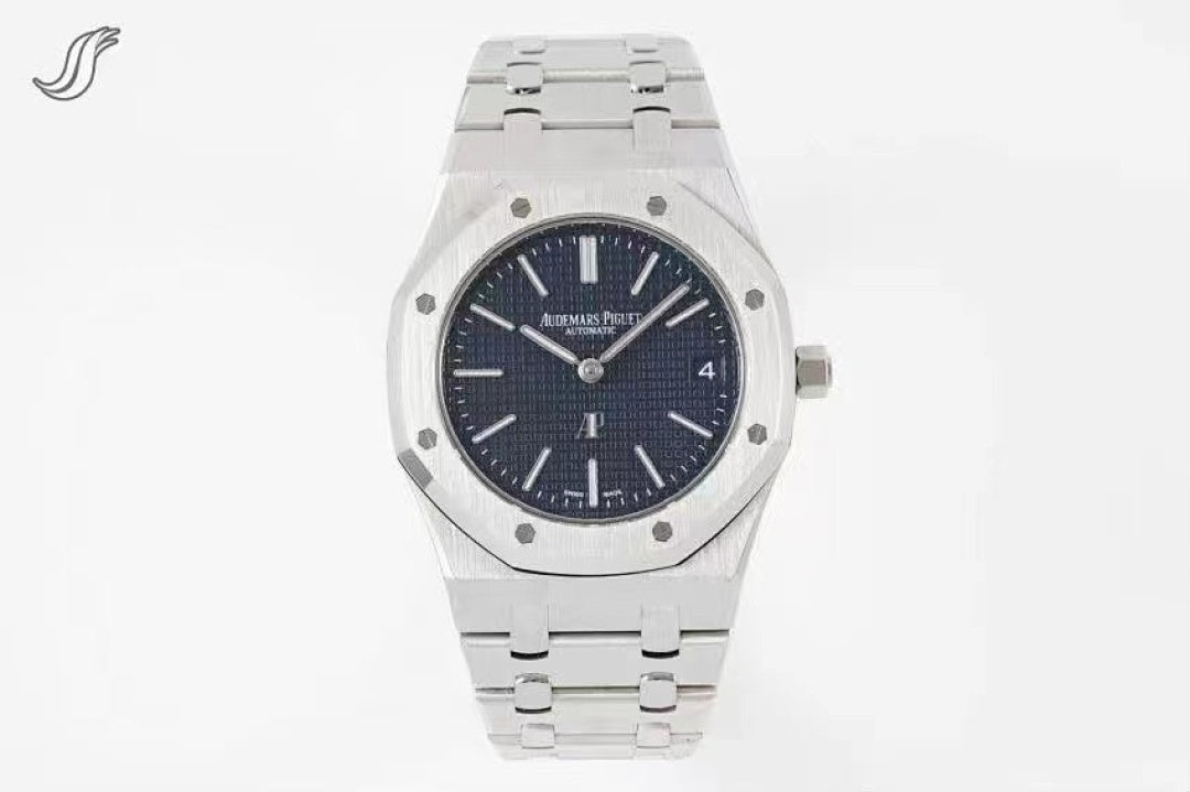 Stainless steel wristwatch with dark blue dial and link bracelet.
