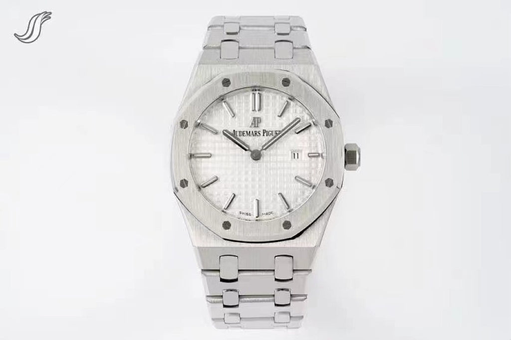 Stainless steel wristwatch with silver dial and link bracelet.