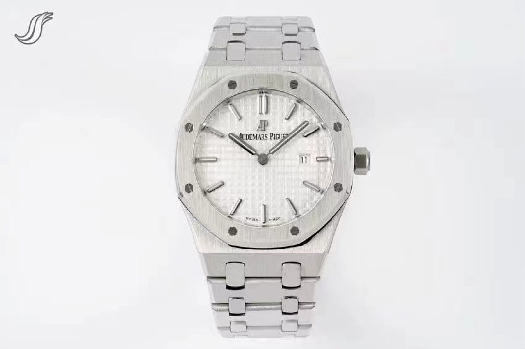 Stainless steel wristwatch with silver dial and link bracelet.