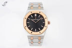 Two-tone wristwatch with black dial, rose gold bezel details, and link bracelet.