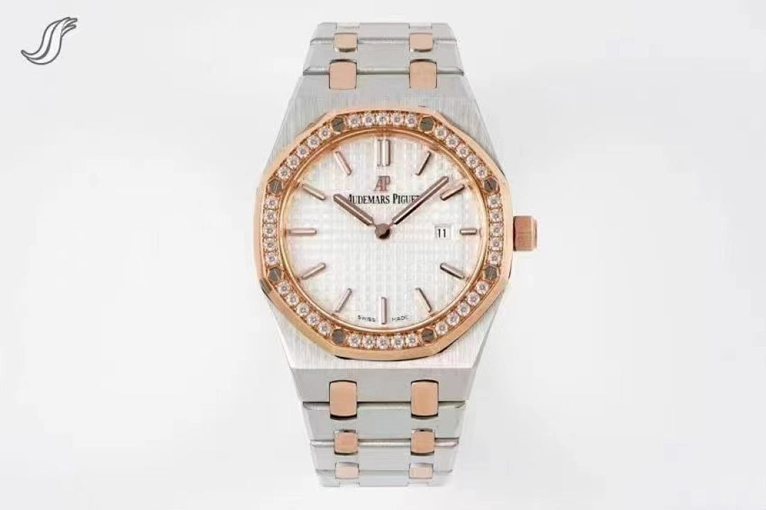 Two-tone wristwatch with white dial, diamond bezel, and link bracelet with rose gold accents.