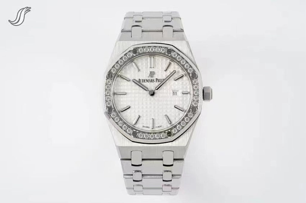 Audemars Piguet watch with silver dial and diamond bezel on stainless bracelet