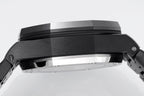 Audemars Piguet watch case profile with black bezel and brushed metal body