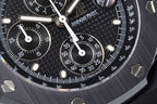 Audemars Piguet black dial chronograph with three subdials and raised time markers