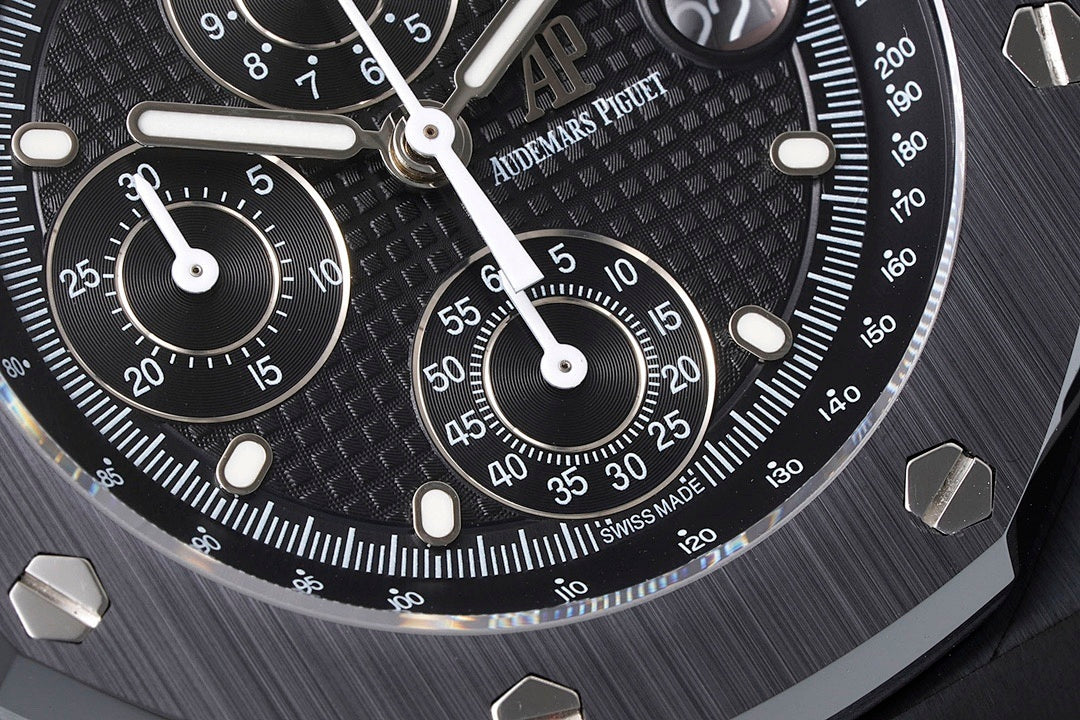 Audemars Piguet black dial chronograph with three subdials and raised time markers