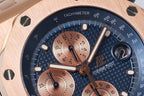 Audemars Piguet chronograph dial close-up with blue textured face, gold hands and subdials