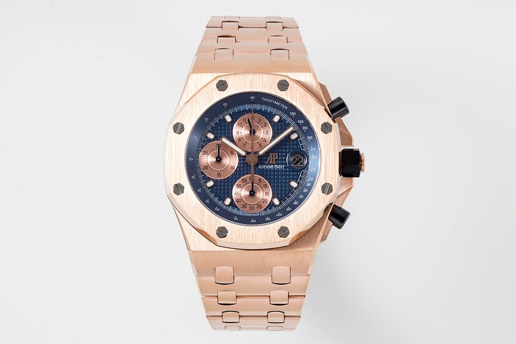 Audemars Piguet octagonal rose gold wristwatch with blue dial and metal bracelet links