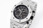 Audemars Piguet luxury chronograph watch with black dial and silver bracelet, angled view.