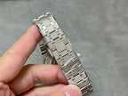 Audemars Piguet Royal Oak watch with silver metal link bracelet, side view