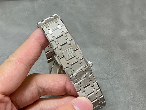 Audemars Piguet Royal Oak watch with silver metal link bracelet, side view