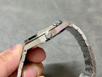 Audemars Piguet Royal Oak watch clasp and links, silver metal bracelet, side view
