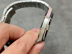 Audemars Piguet Royal Oak watch with silver metal bracelet, angled case view