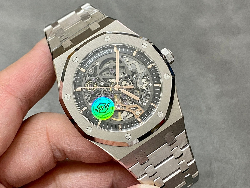 Audemars Piguet Royal Oak watch dial close-up, skeleton hands and green emblem
