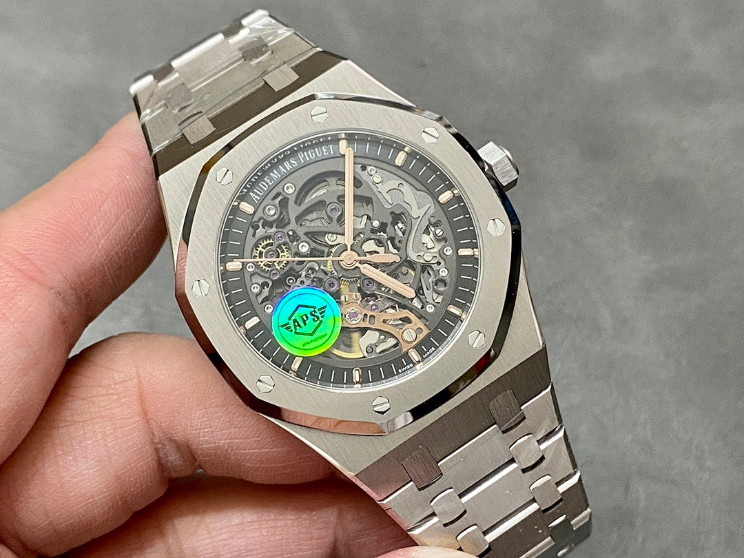 Audemars Piguet Royal Oak watch dial close-up, skeleton hands and green emblem
