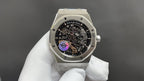 Luxury skeleton wristwatch, silver steel case, black dial, purple and gold accents