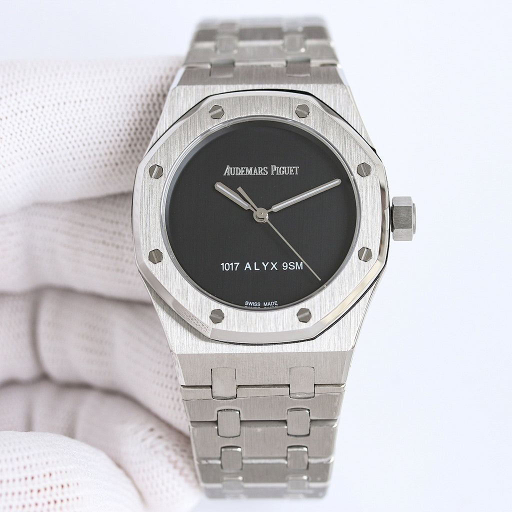 Audemars Piguet watch with black dial, stainless steel bracelet, visible crown at side