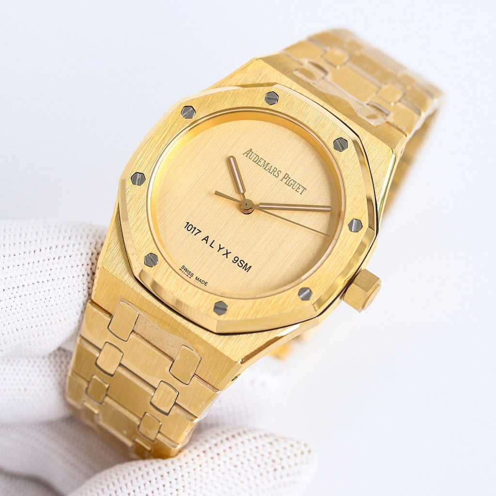 Gold-tone wristwatch with round dial and integrated metal link bracelet