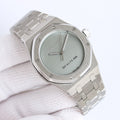 Audemars Piguet watch with light green dial and stainless steel link bracelet