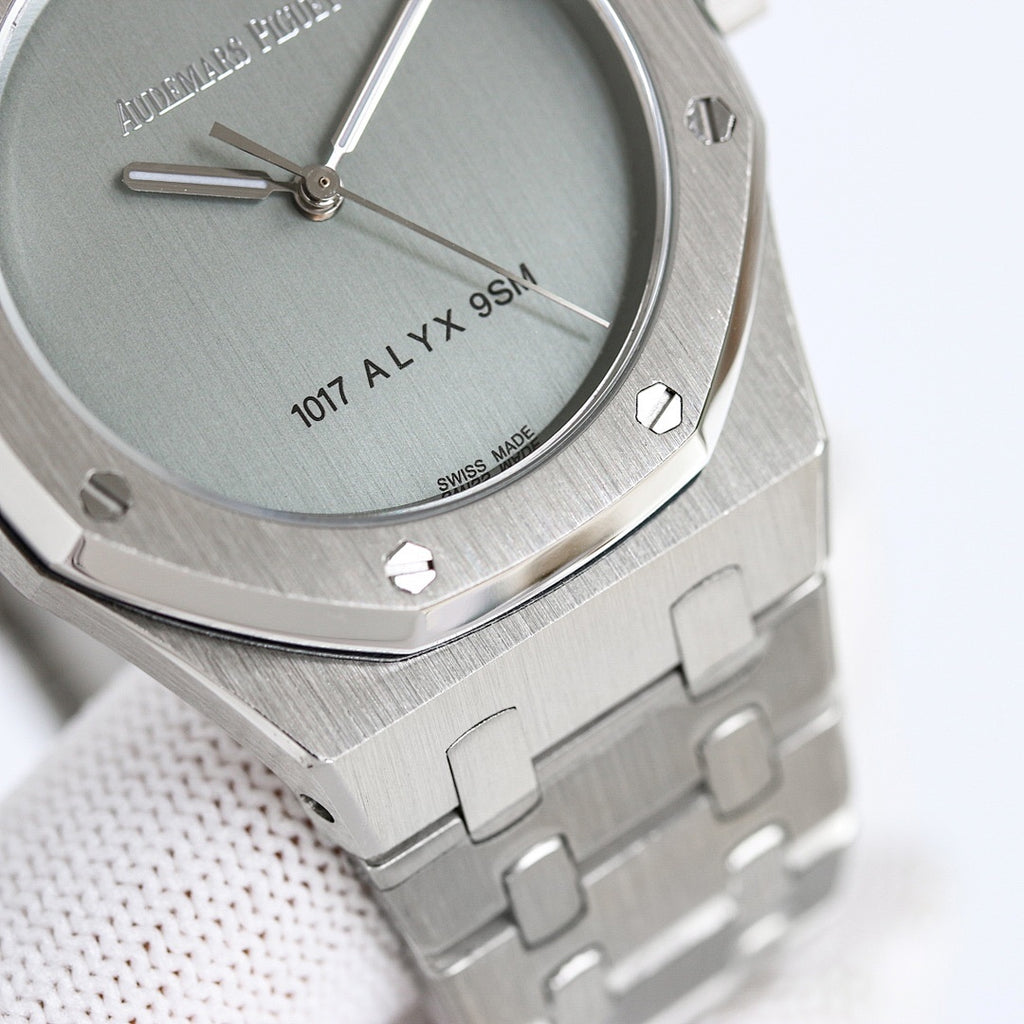 Audemars Piguet watch close-up of light green dial and metal bracelet