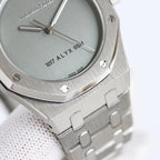 Audemars Piguet watch close-up of light green dial and metal bracelet