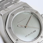Audemars Piguet watch angled view with light green dial and octagonal bezel