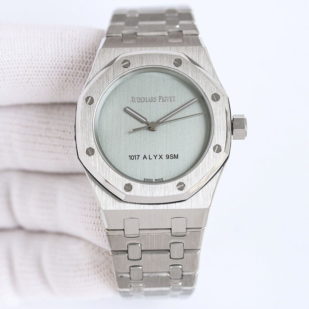 Audemars Piguet watch front view with light green dial and stainless steel bracelet
