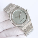 Audemars Piguet watch with light green dial and stainless steel bracelet close-up