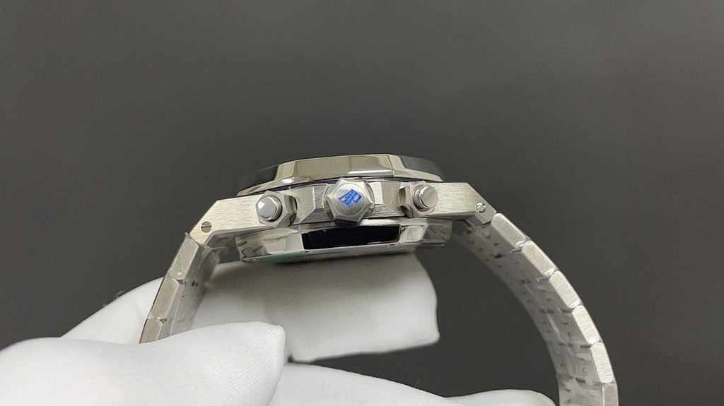 Audemars Piguet stainless steel watch with crown and pushers, bracelet link detail