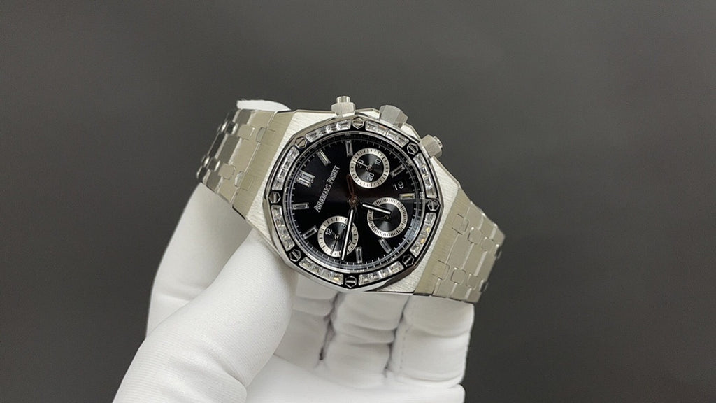 Audemars Piguet stainless steel chronograph watch on linked bracelet, front angle view