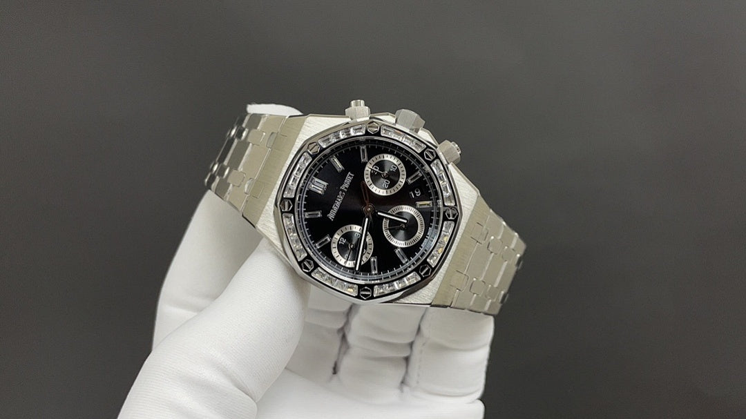 Audemars Piguet stainless steel chronograph watch on linked bracelet, front angle view