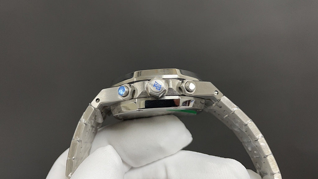 Audemars Piguet steel chronograph watch with blue dial and crown detail