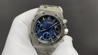 Audemars Piguet steel wristwatch with blue dial and three chronograph subdials